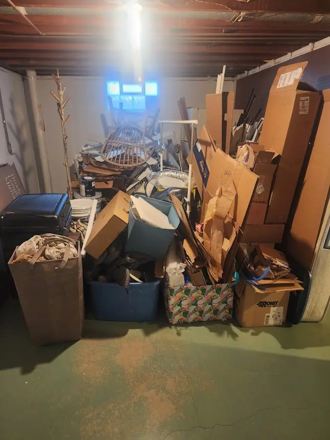 Roll-off dumpster container at job site for Yard Waste Dumpster Rental in Littleton